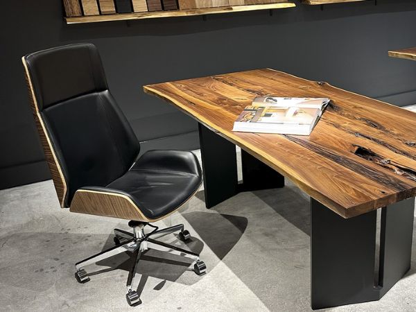 Executive live edge desk with black leather office chair, modern workspace furniture for home or corporate office